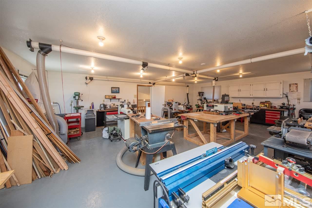 855 Lampe Road Reno, NV 89511 - Photo 24 of 30 a room with lots of furniture and clutter