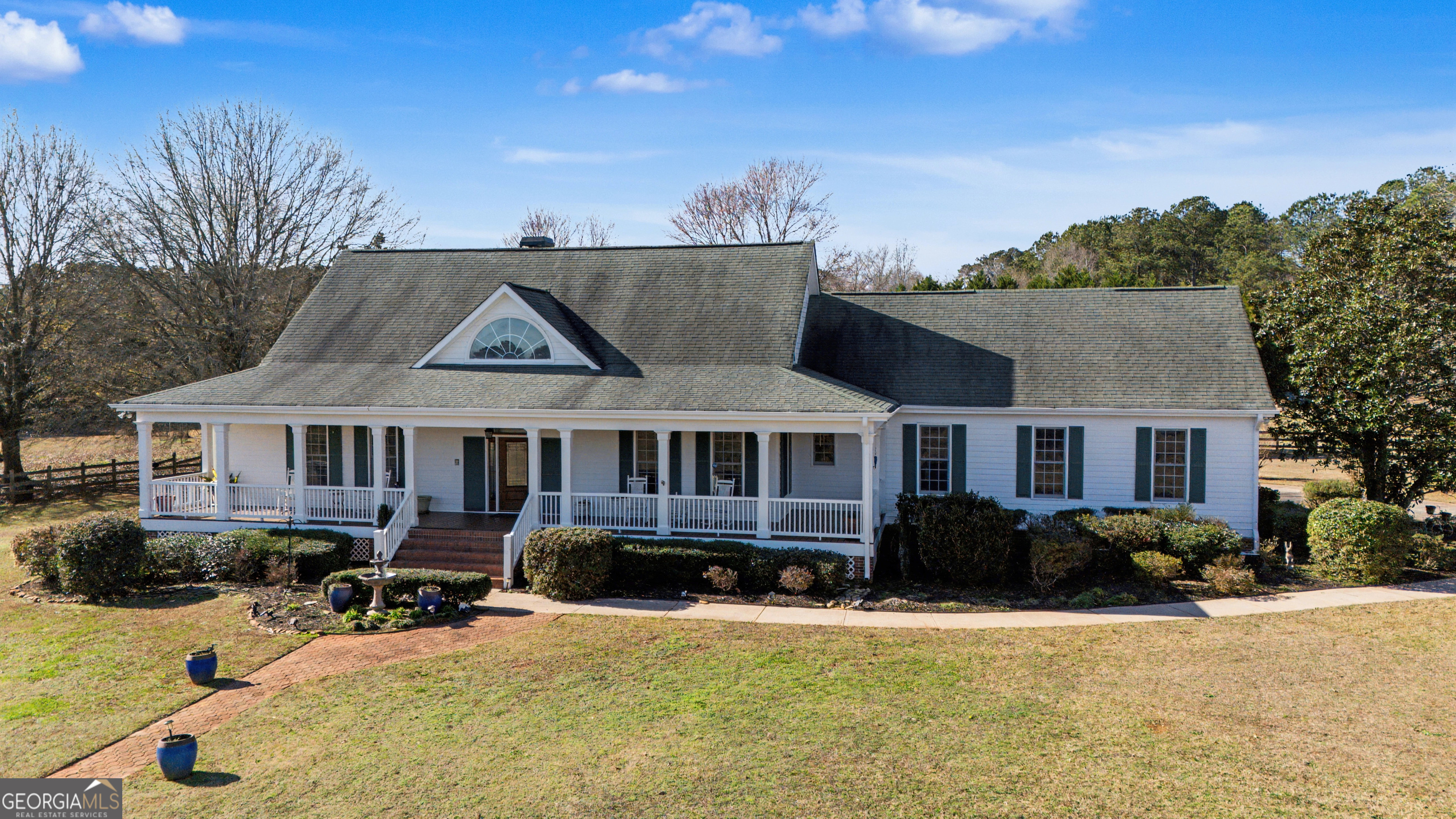 front view of a house with a patio