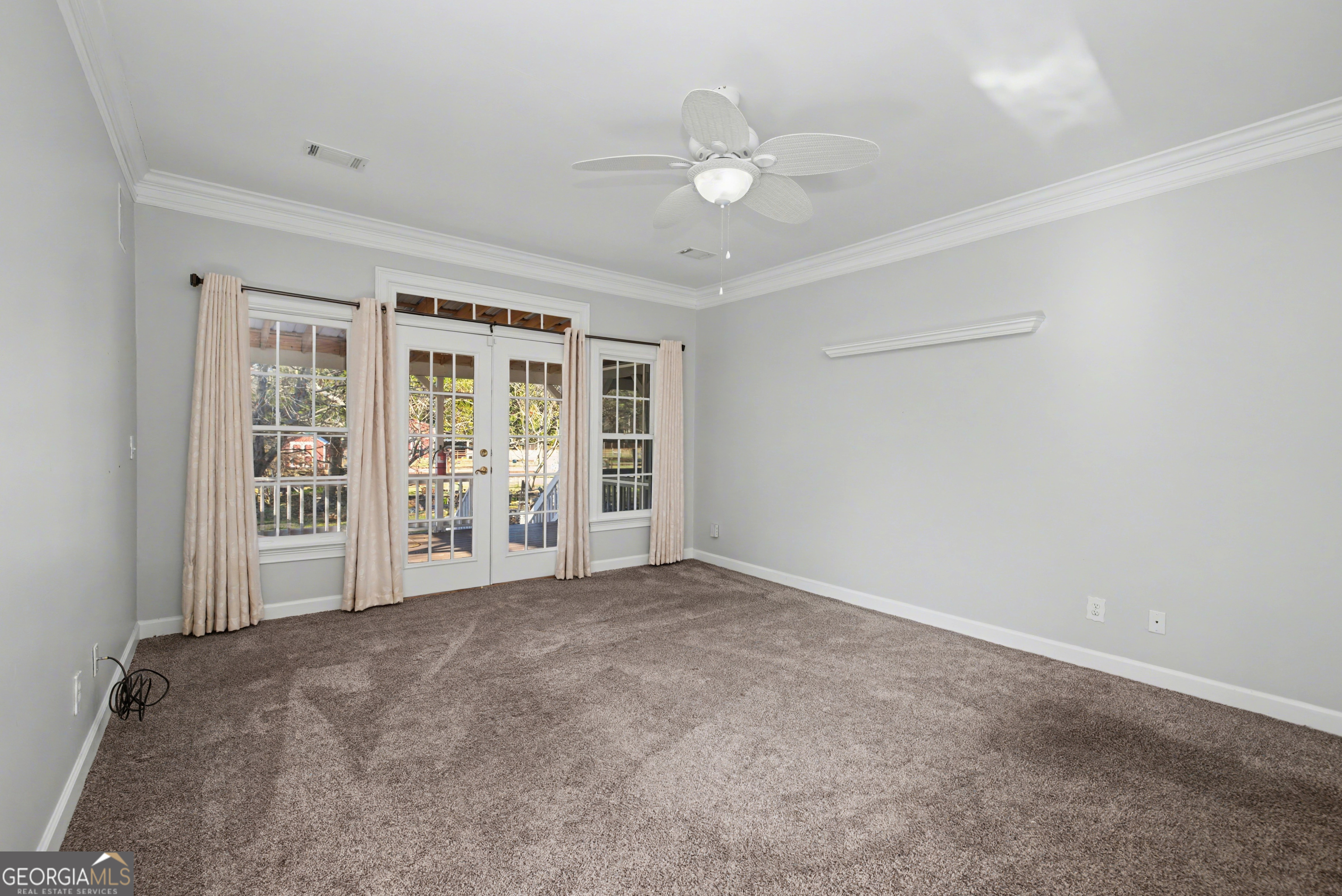 159 Friar Tuck Road Fayetteville, GA 30215 - Photo 20 of 68 a view of an empty room with a window