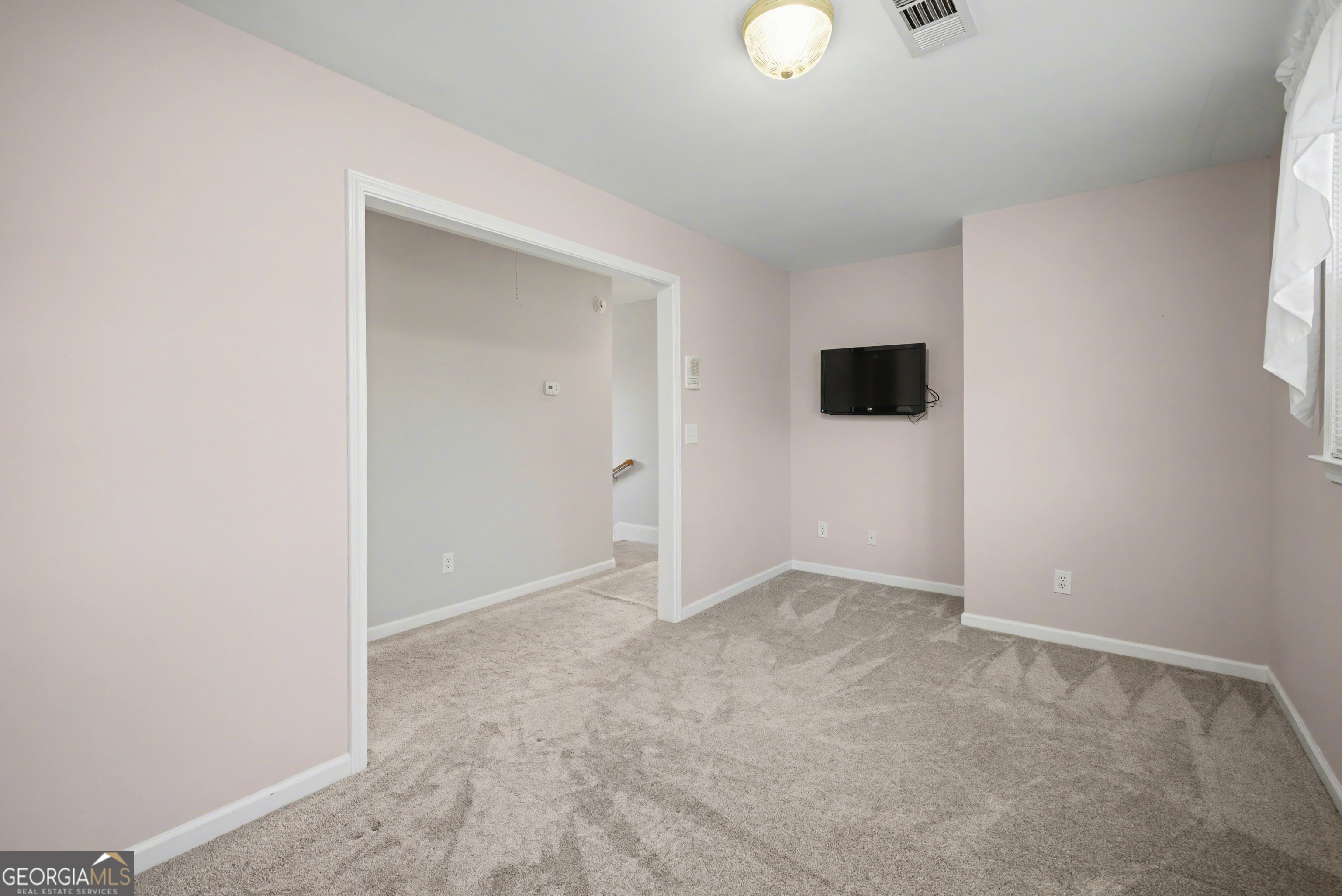 159 Friar Tuck Road Fayetteville, GA 30215 - Photo 39 of 68 an empty room with closet area