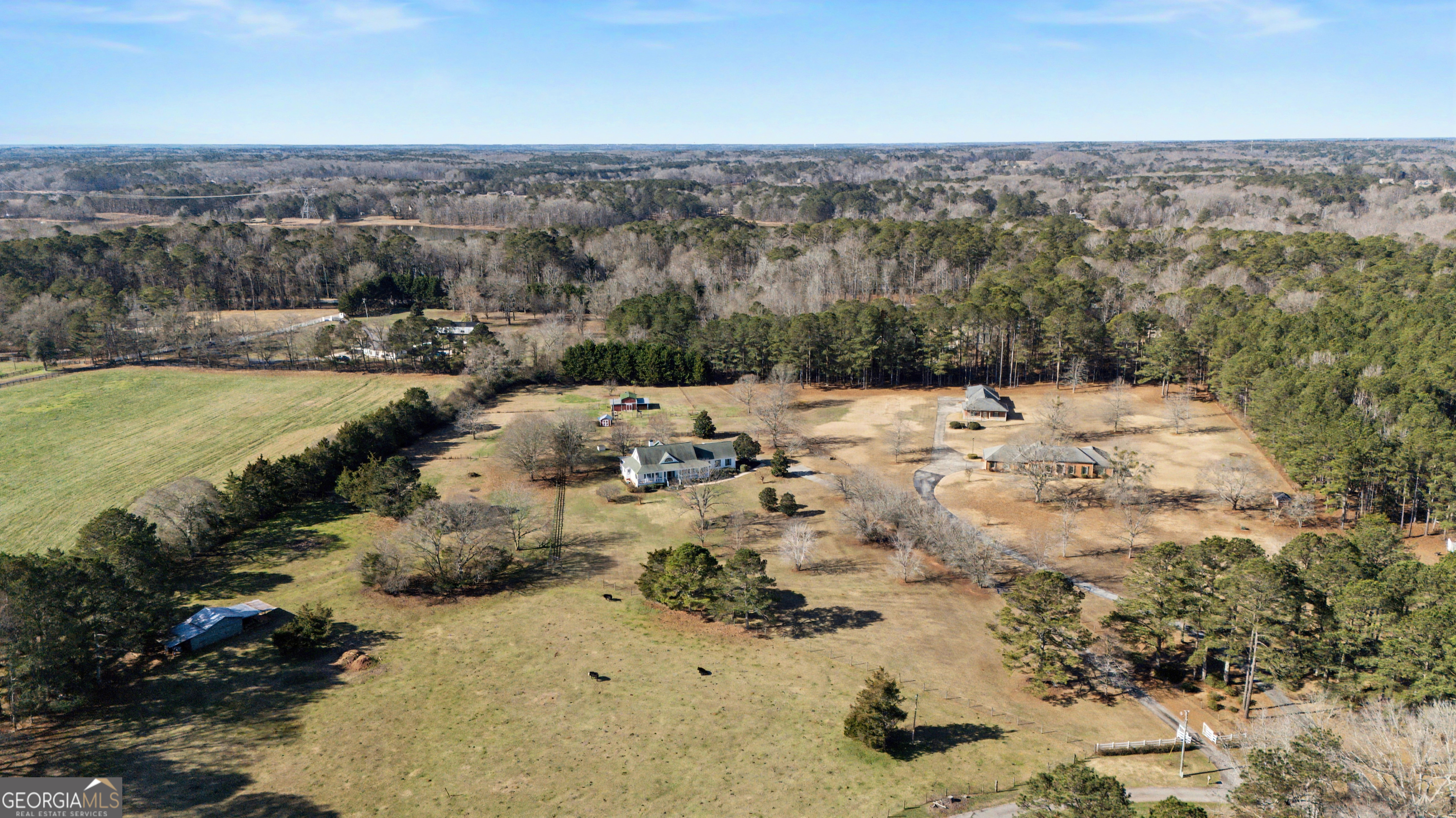 159 Friar Tuck Road Fayetteville, GA 30215 - Photo 61 of 68 a view of a lake with a mountain beach