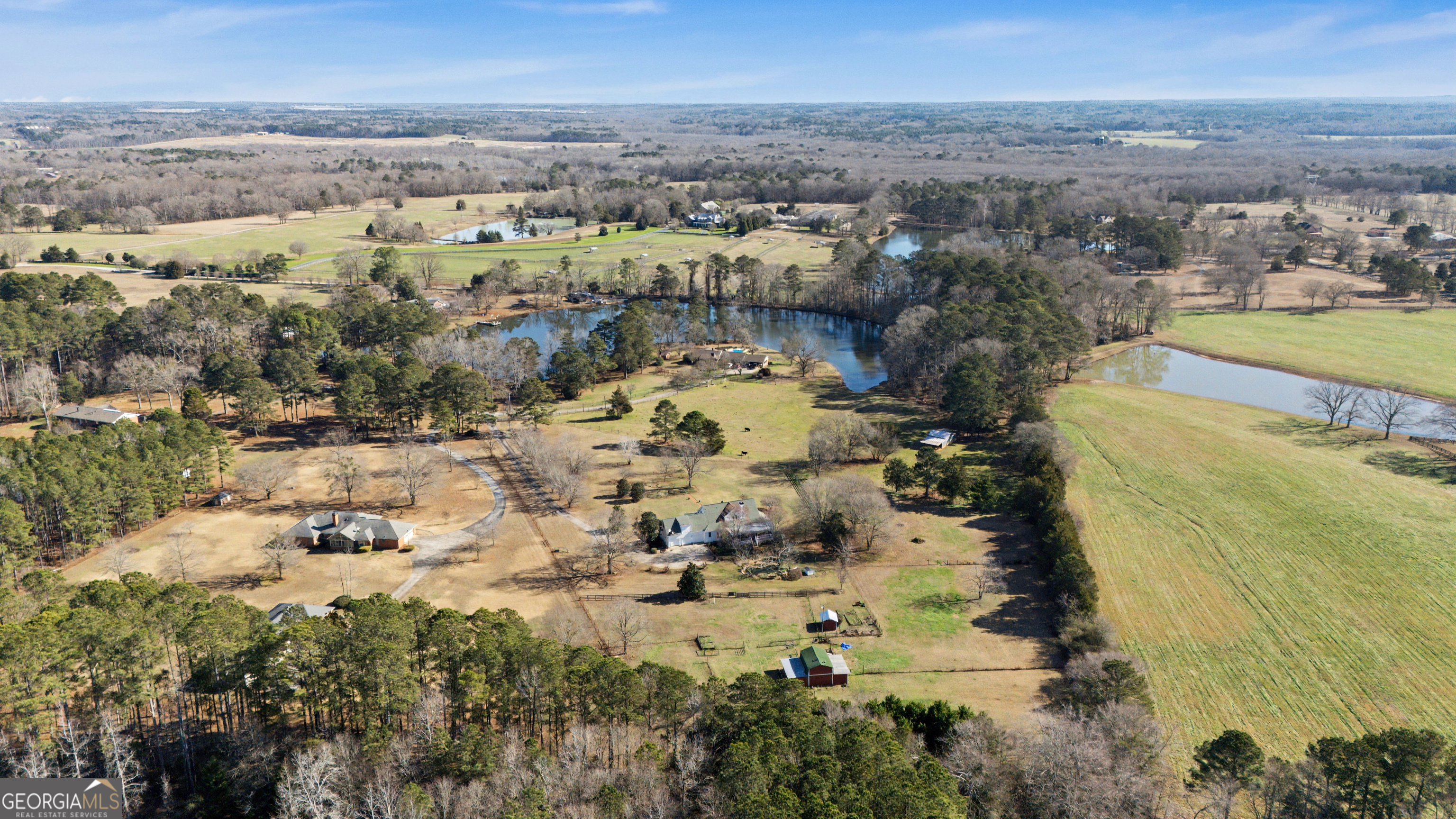 159 Friar Tuck Road Fayetteville, GA 30215 - Photo 63 of 68 an aerial view of residential building and lake view