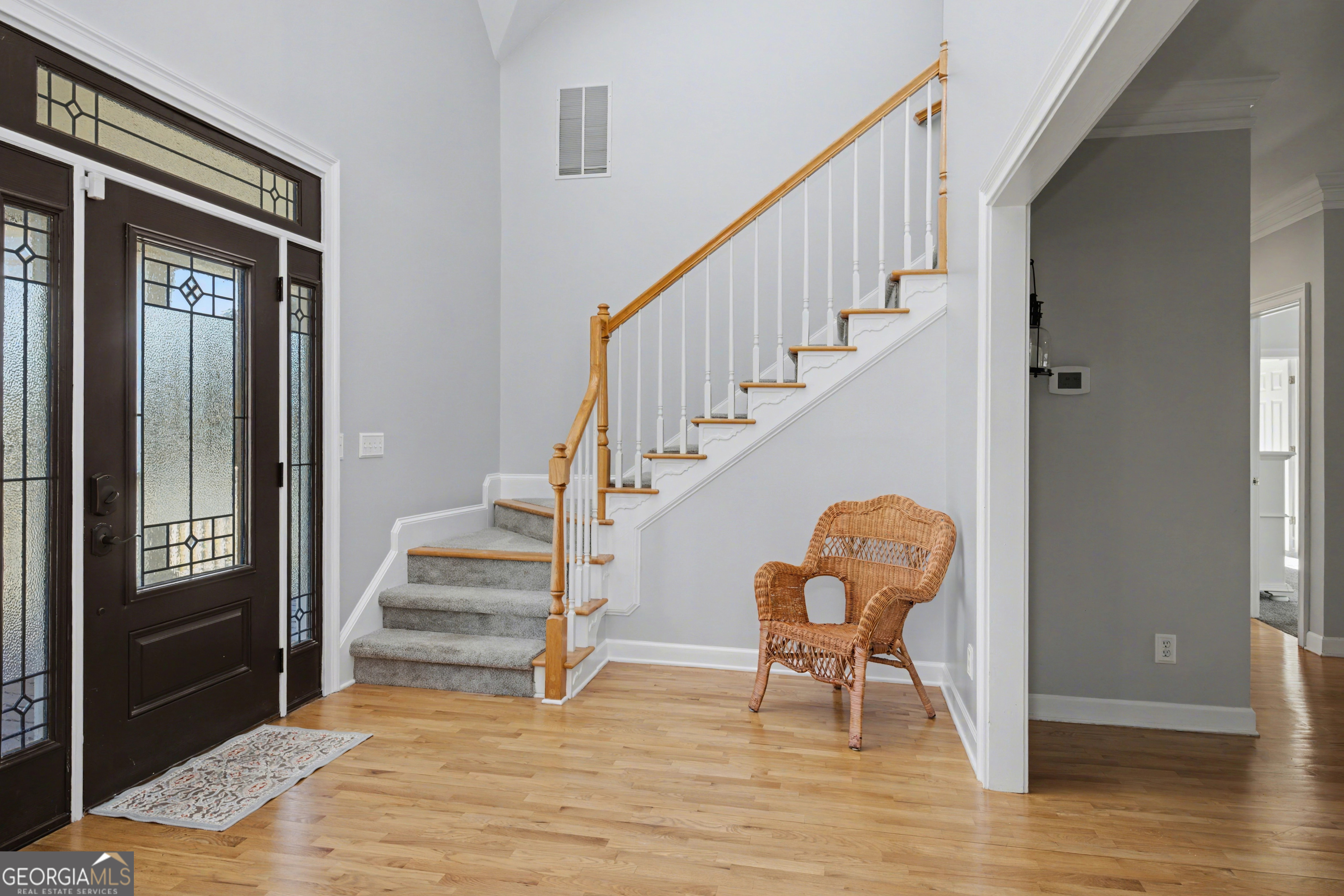 159 Friar Tuck Road Fayetteville, GA 30215 - Photo 9 of 68 a view of entryway and hall with wooden floor