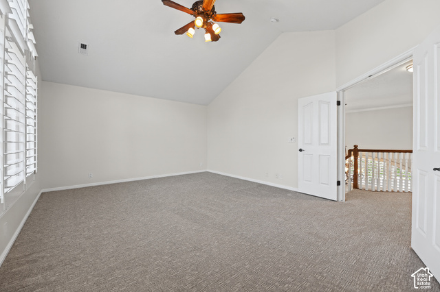 10664 Trail Ridge Circle Sandy, UT 84092 - Photo 27 of 113 Vaulted ceiling, ceiling fan with integrated lighting, plantation shutters, grey carpeting, and white paneled doors