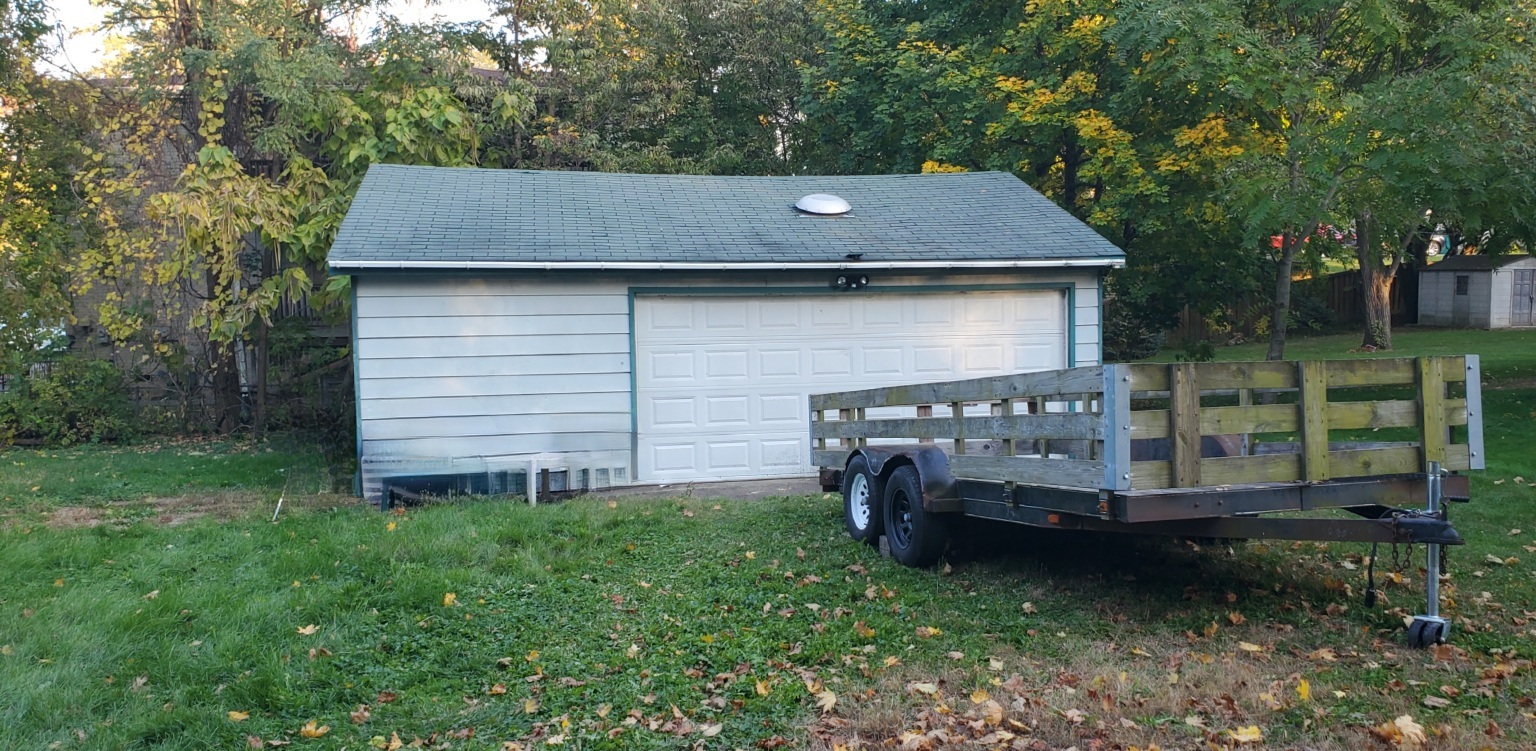91 Lippincott Road Fox Lake, IL 60020 - Photo 29 of 40 a view of a wooden house with a small yard and wooden fence