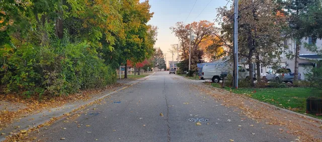a view of a lake with a yard