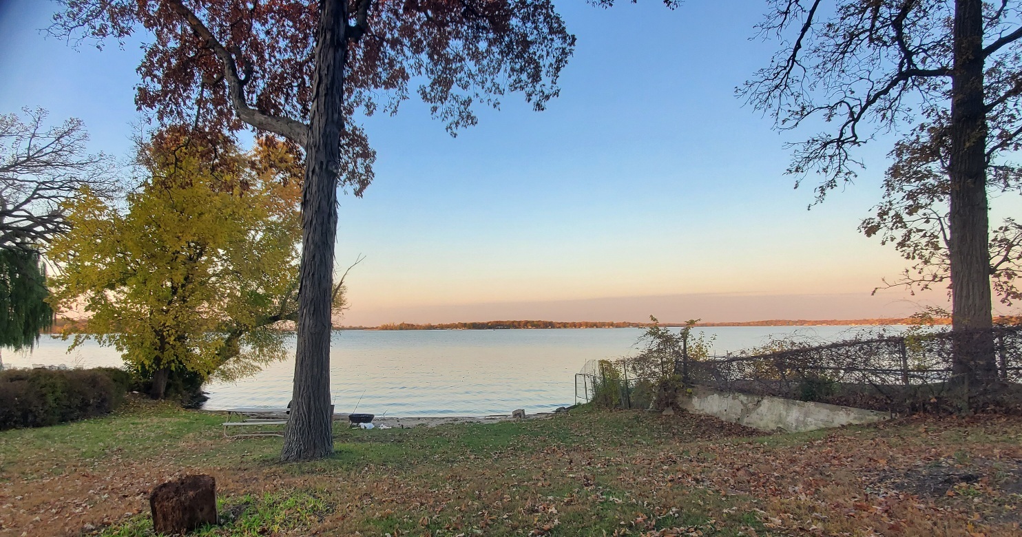 91 Lippincott Road Fox Lake, IL 60020 - Photo 38 of 40 a view of a lake with a yard