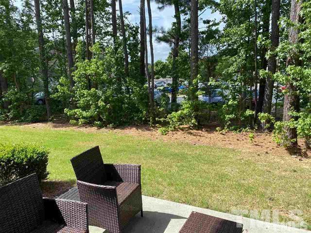 2424 Pecan Ridge Way Apex, NC 27502 - Photo 2 of 9 a view of yard with outdoor seating