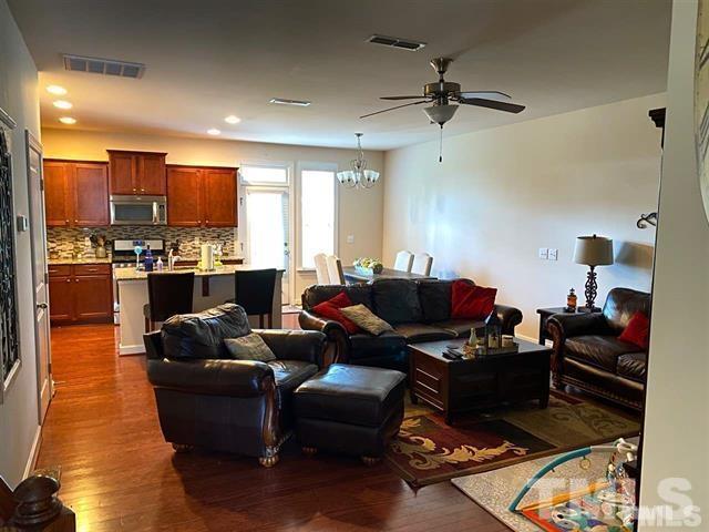2424 Pecan Ridge Way Apex, NC 27502 - Photo 3 of 9 a living room with furniture