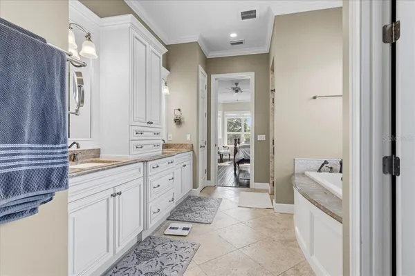 a bathroom with a toilet and a bathtub
