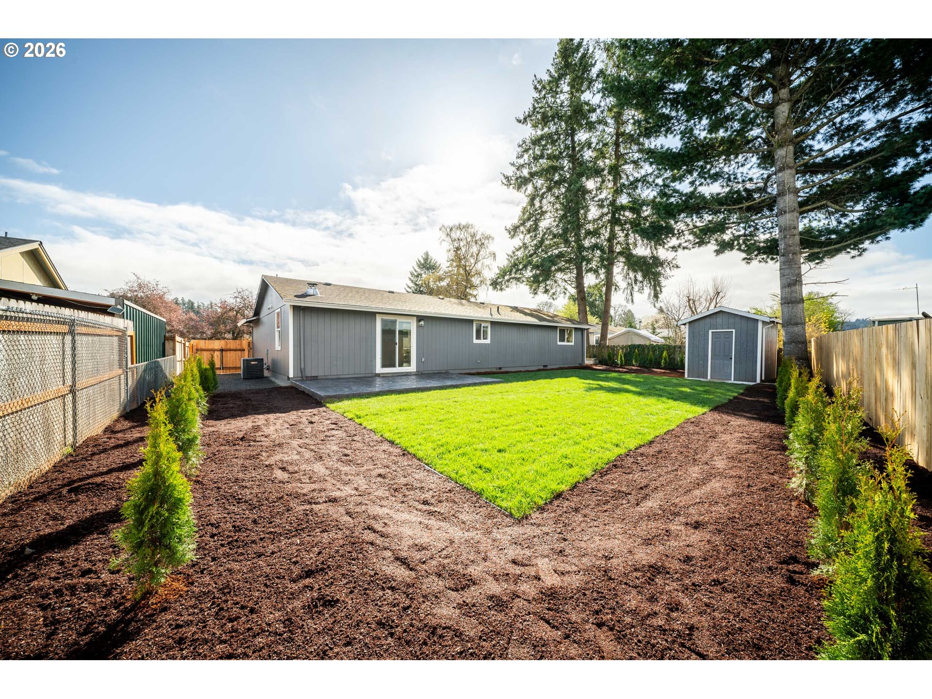 879 North Broadway Street Estacada, OR 97023 - Photo 26 of 37 a view of a backyard with a garden