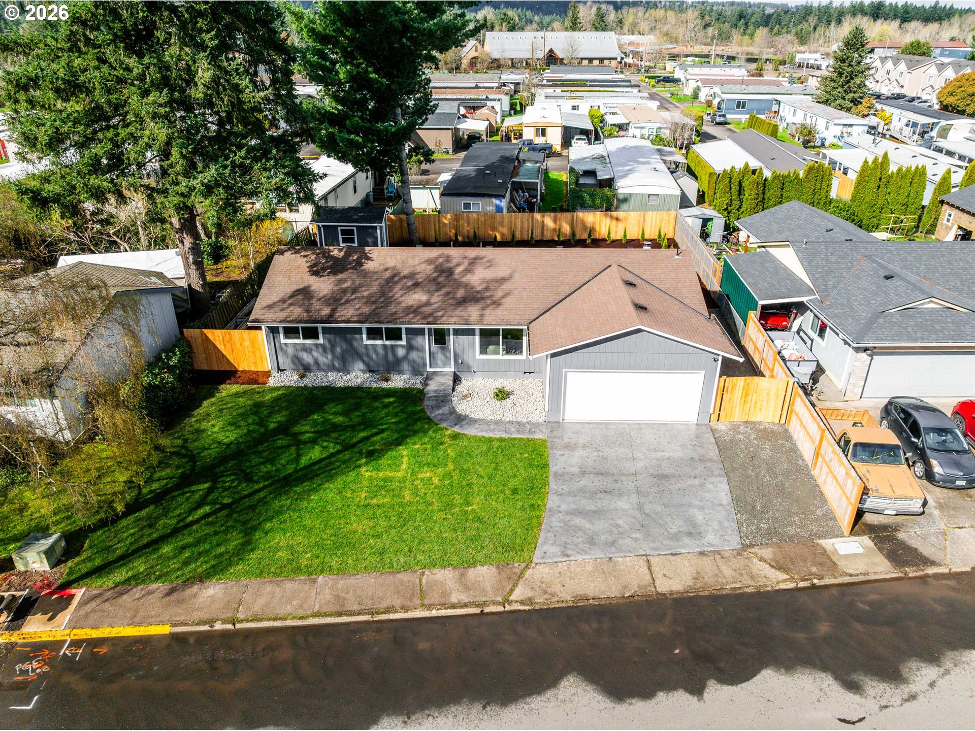 879 North Broadway Street Estacada, OR 97023 - Photo 33 of 37 an aerial view of residential houses with yard