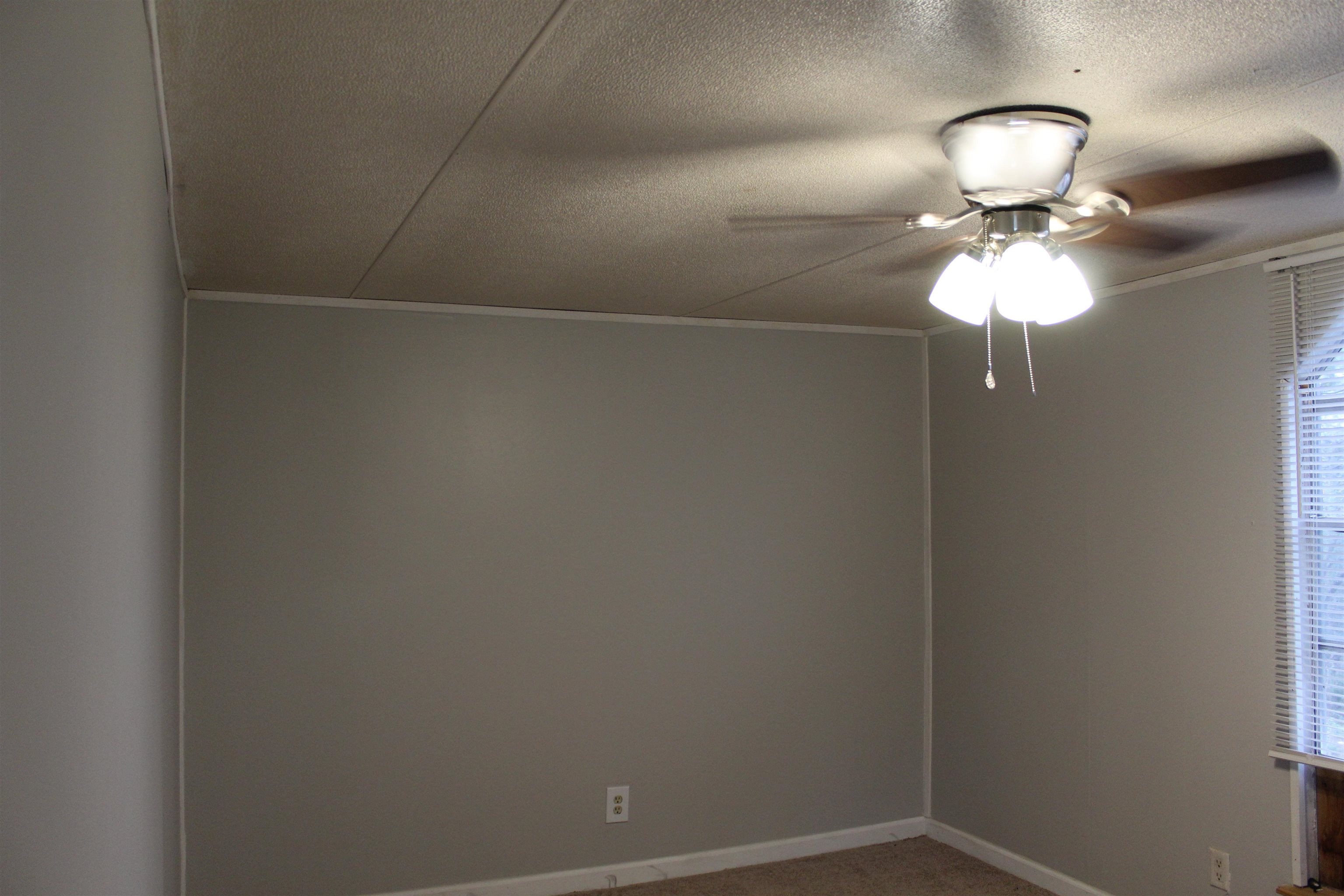 919 Austin Street Kingsland, TX 78639 - Photo 7 of 7 a bathroom with a sink and a mirror