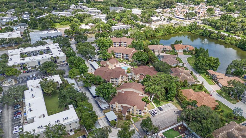 1550 South Belcher Road, Unit 525 Clearwater, FL 33764 - Photo 27 of 28 an aerial view of residential houses with outdoor space and trees all around