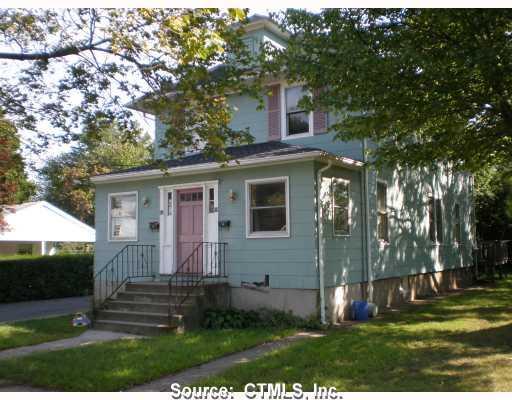 50 5th Street Bristol, CT 06010 - Photo 1 of 1 a front view of a house with garden
