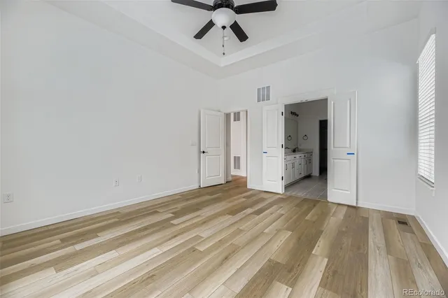 a bathroom with a double vanity sink and mirror