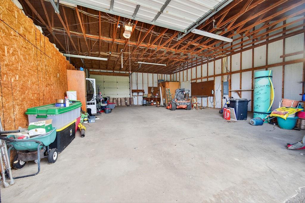 9474 Fm 804 Larue, TX 75770 - Photo 15 of 25 a view of a garage with a table and chairs