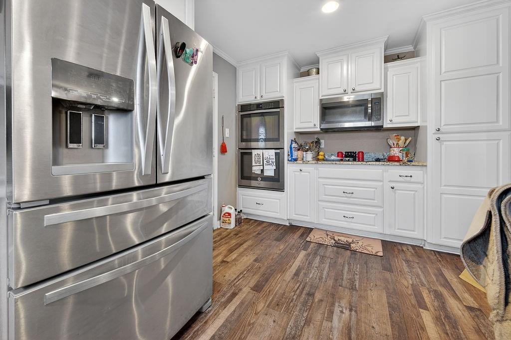 9474 Fm 804 Larue, TX 75770 - Photo 18 of 25 a kitchen with stainless steel appliances a refrigerator and a stove top oven
