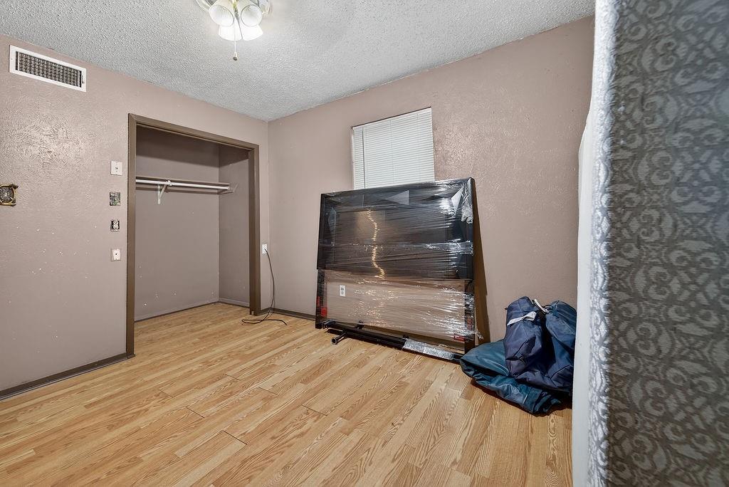 9474 Fm 804 Larue, TX 75770 - Photo 9 of 25 a bedroom with a bed and a flat screen tv
