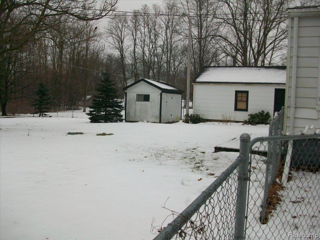 501 County Farm Road Howell, MI 48843 - Photo 19 of 22 Back Yard Shed Garage