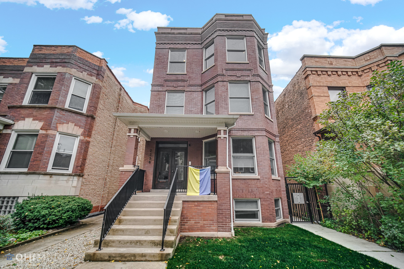 2238 West Walton Street, Unit 3 Chicago, IL 60622 - Photo 1 of 29 a front view of a multi story residential apartment building