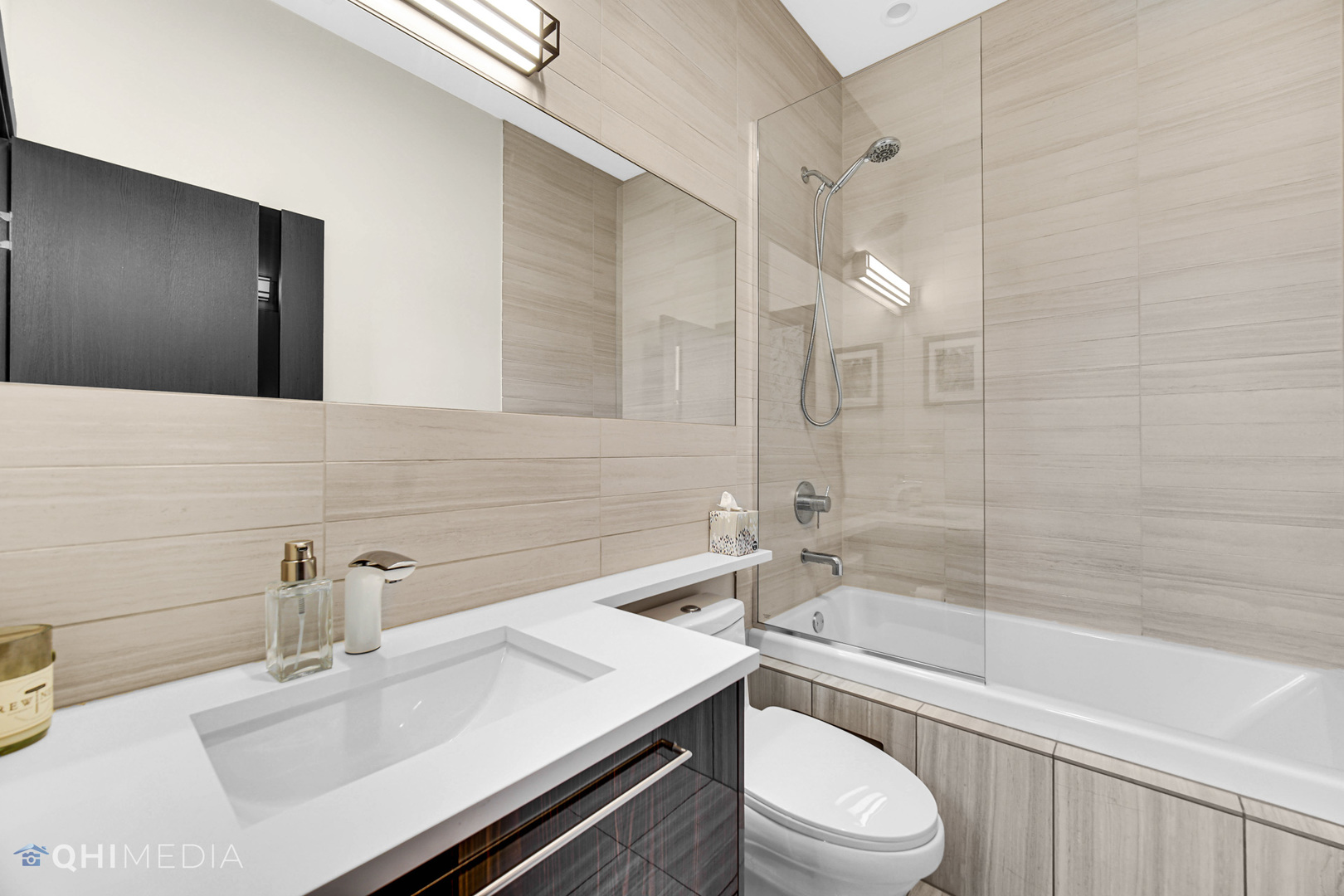 2238 West Walton Street, Unit 3 Chicago, IL 60622 - Photo 15 of 29 a bathroom with a sink a toilet and shower