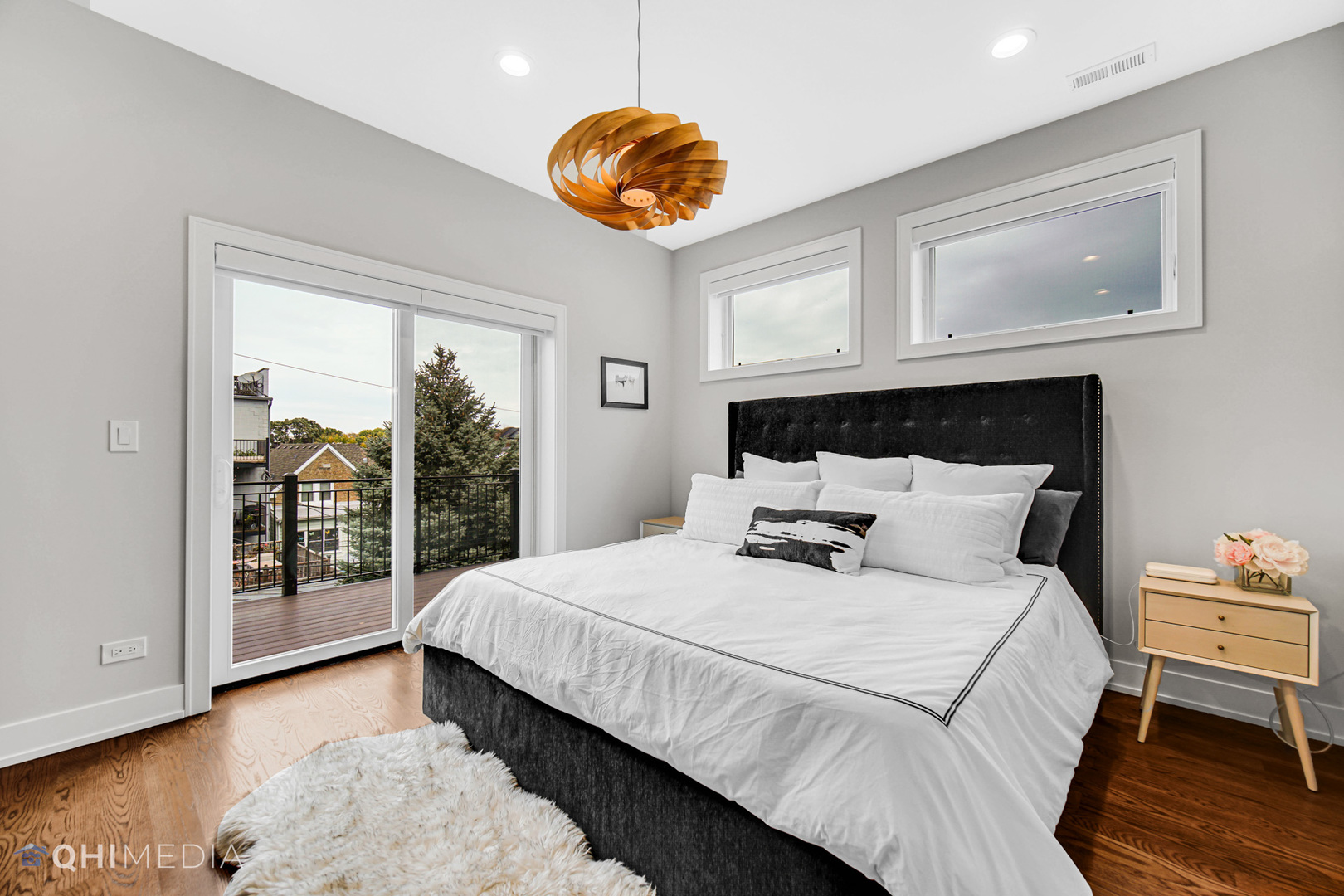 2238 West Walton Street, Unit 3 Chicago, IL 60622 - Photo 17 of 29 a bedroom with a large bed and a large window