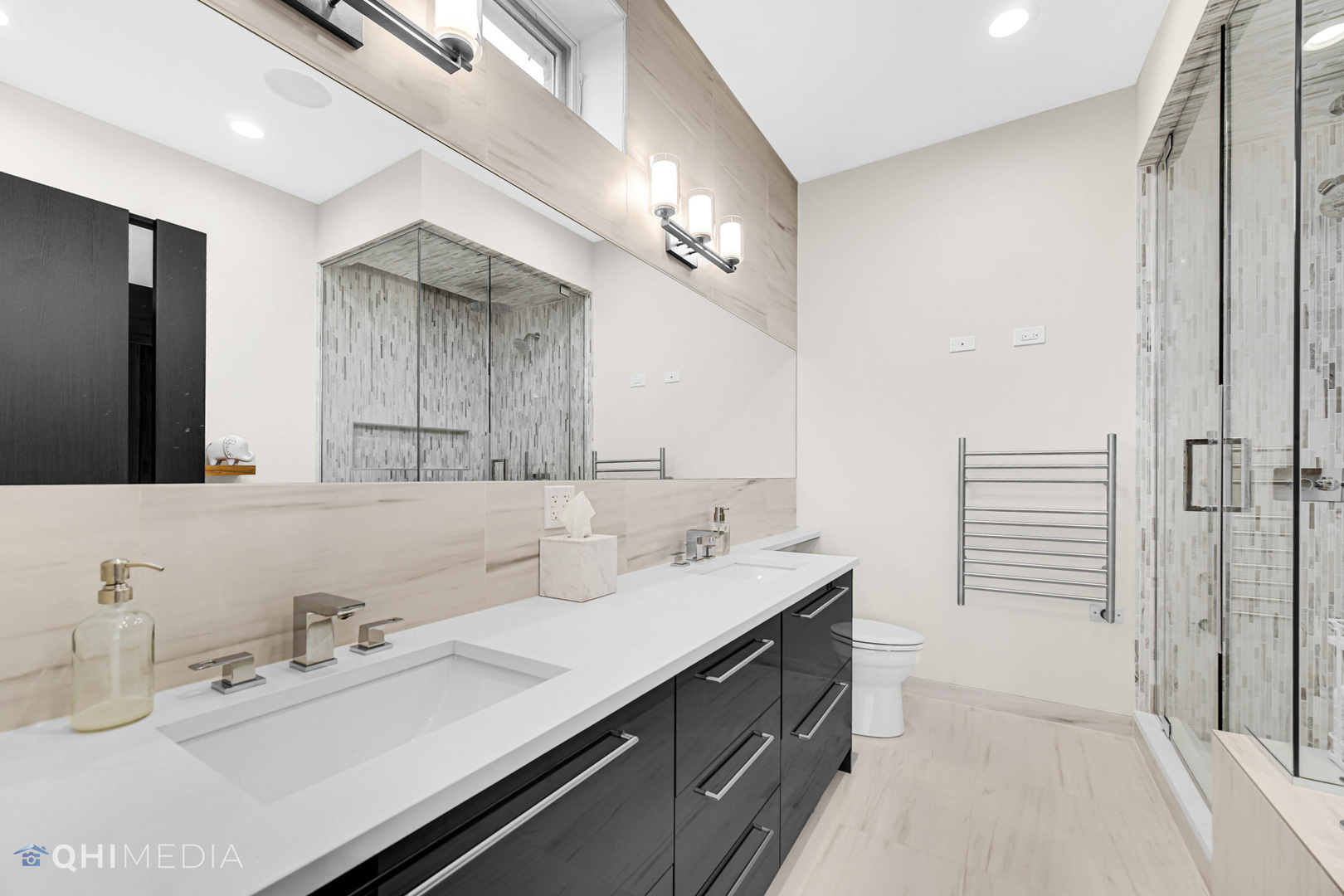 2238 West Walton Street, Unit 3 Chicago, IL 60622 - Photo 19 of 29 a en suite bathroom with double vanity and a mirror