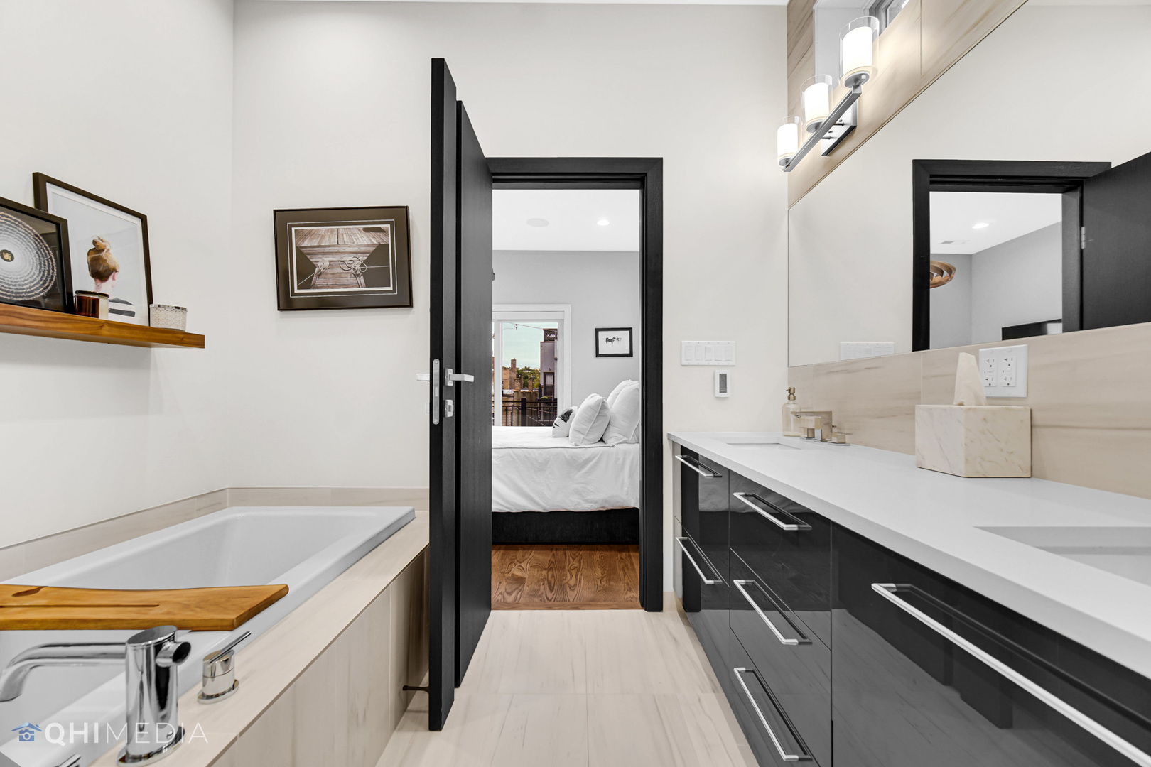 2238 West Walton Street, Unit 3 Chicago, IL 60622 - Photo 20 of 29 a en suite bathroom with a granite countertop sink a toilet a mirror and shower