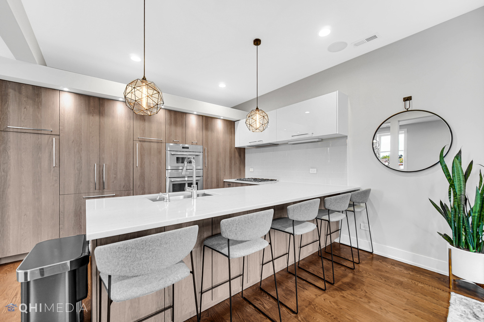 2238 West Walton Street, Unit 3 Chicago, IL 60622 - Photo 6 of 29 a large kitchen with a table and chairs