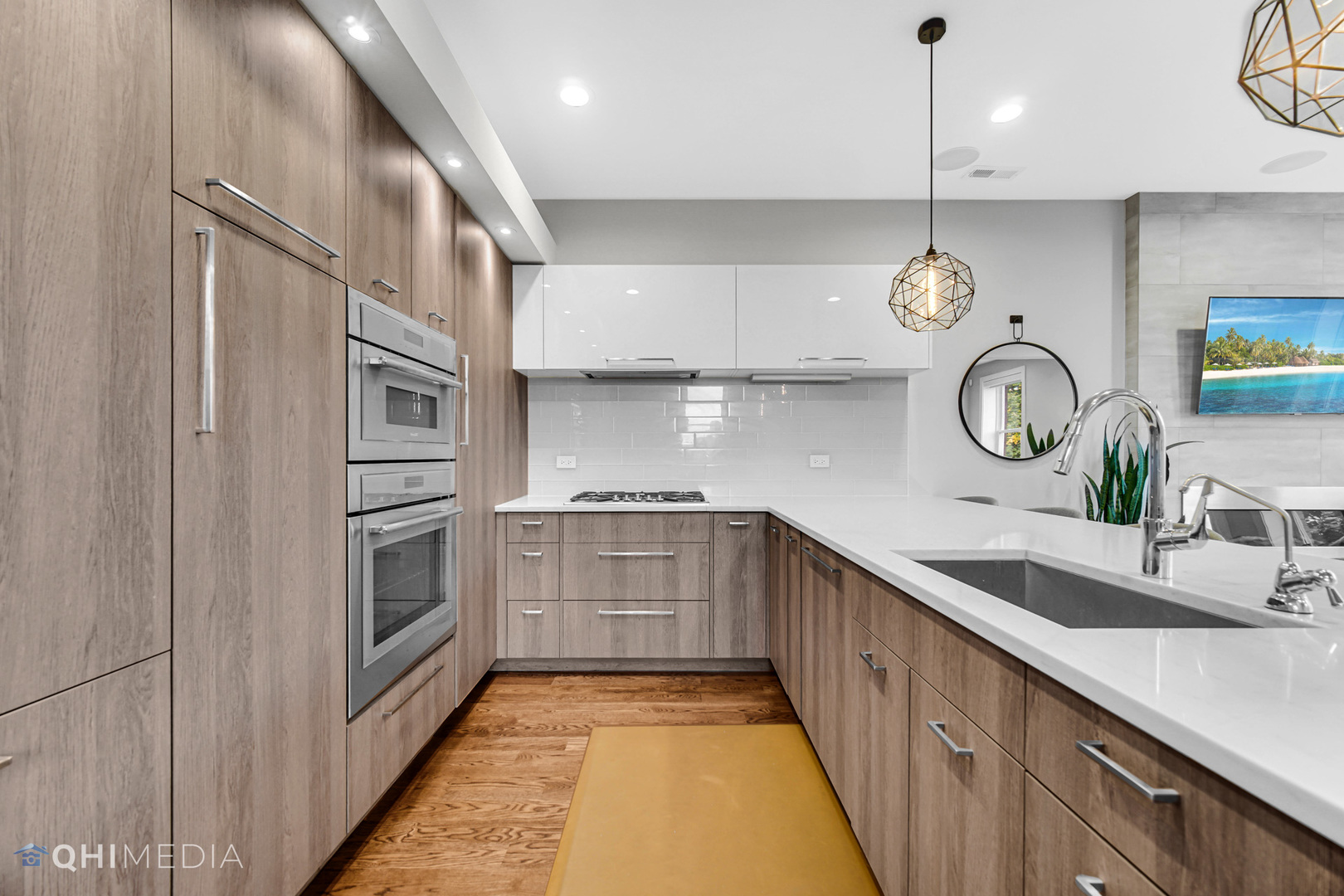 2238 West Walton Street, Unit 3 Chicago, IL 60622 - Photo 7 of 29 a kitchen with cabinets and stainless steel appliances