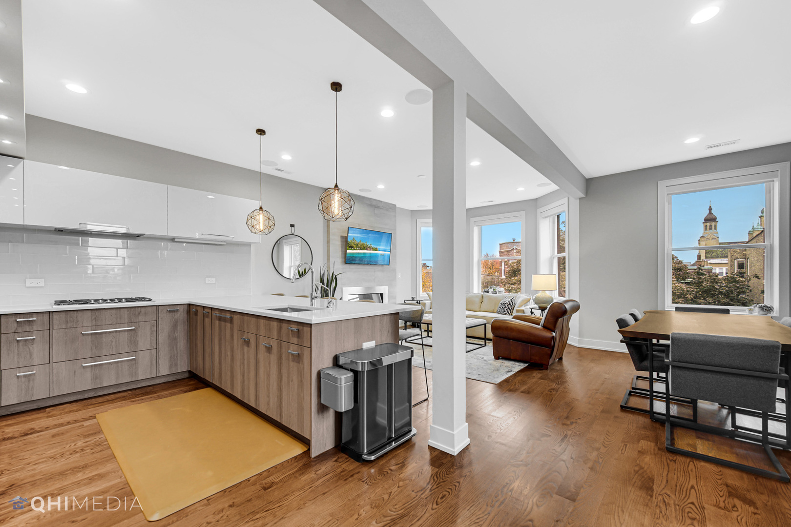 2238 West Walton Street, Unit 3 Chicago, IL 60622 - Photo 8 of 29 a very nice looking living room with kitchen and furniture