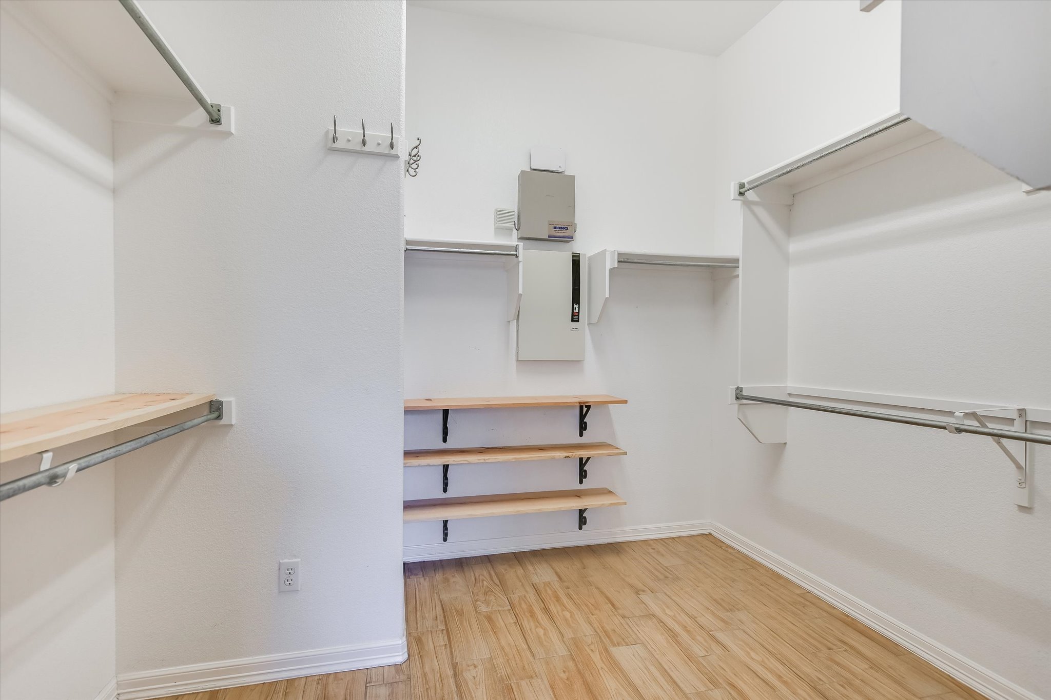 2300 Village View Loop Pflugerville, TX 78660 - Photo 13 of 25 a view of walk in closet with empty racks