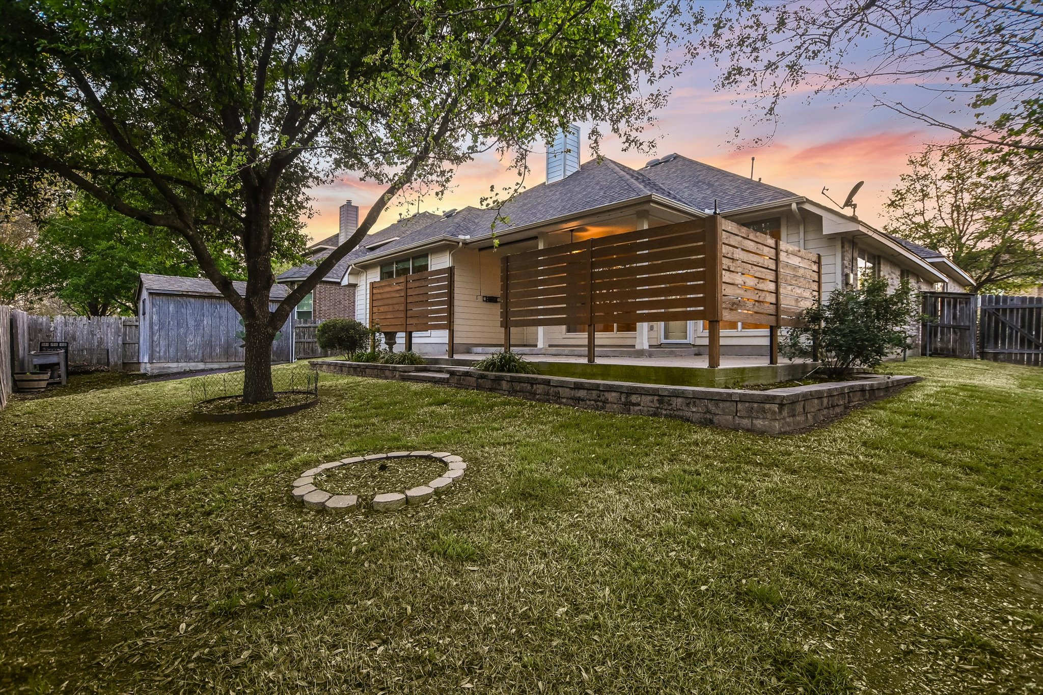 2300 Village View Loop Pflugerville, TX 78660 - Photo 17 of 25 a view of a house with backyard and trees