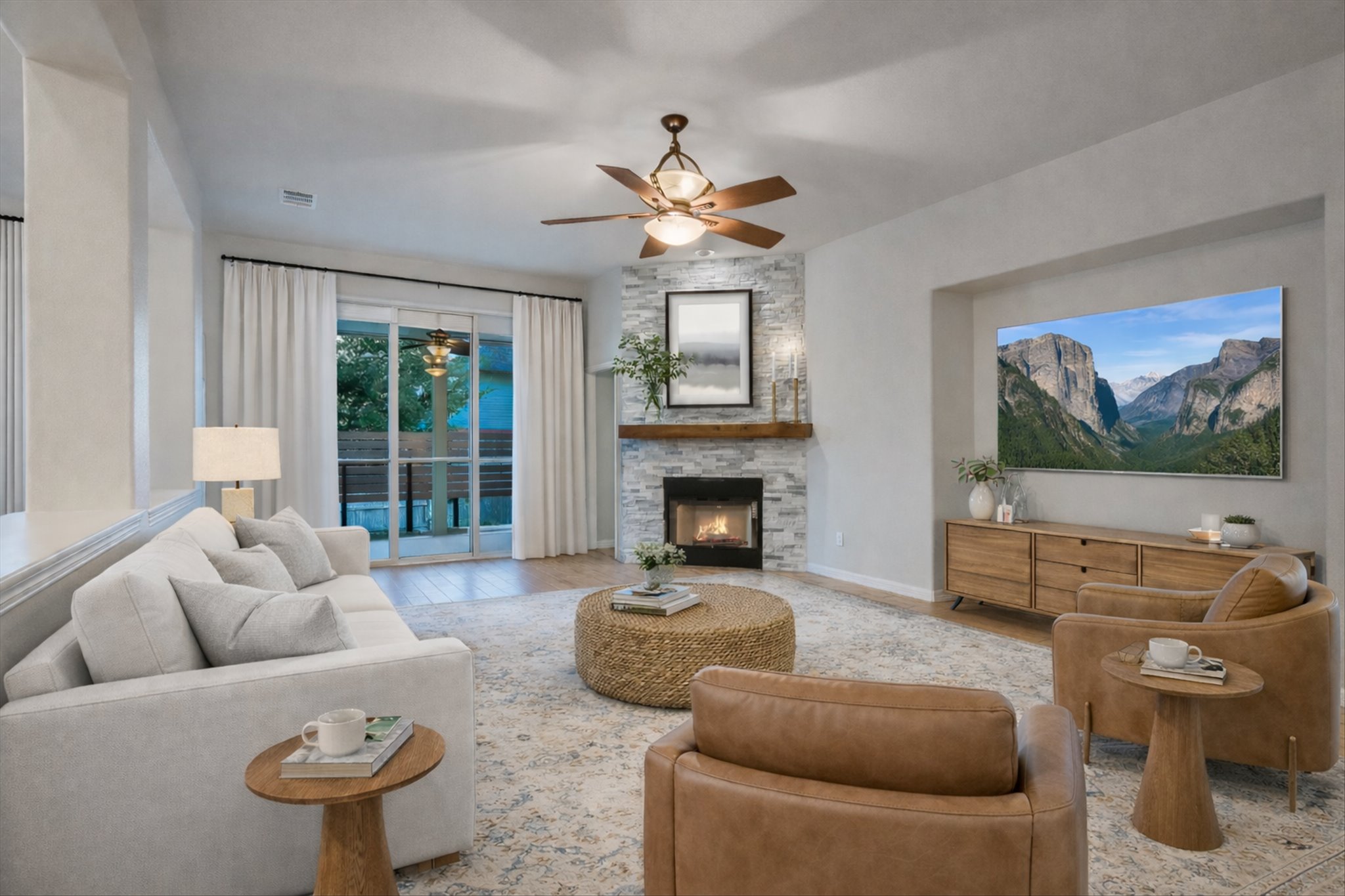2300 Village View Loop Pflugerville, TX 78660 - Photo 5 of 25 a living room with furniture and a fireplace