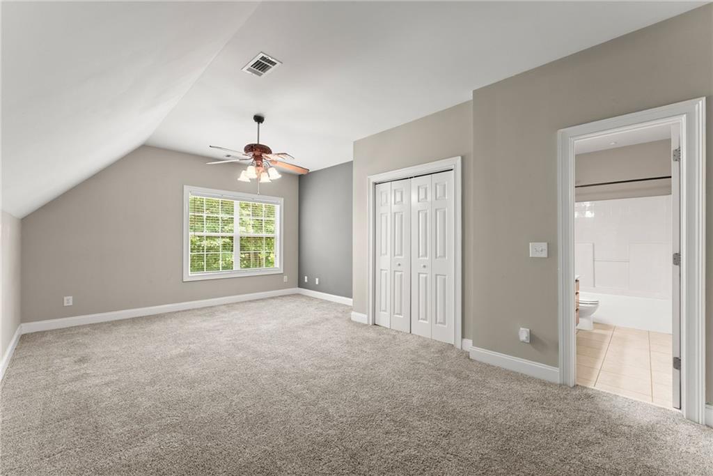 6643 Windvane Point Clermont, GA 30527 - Photo 45 of 88 a view of an empty room with a window
