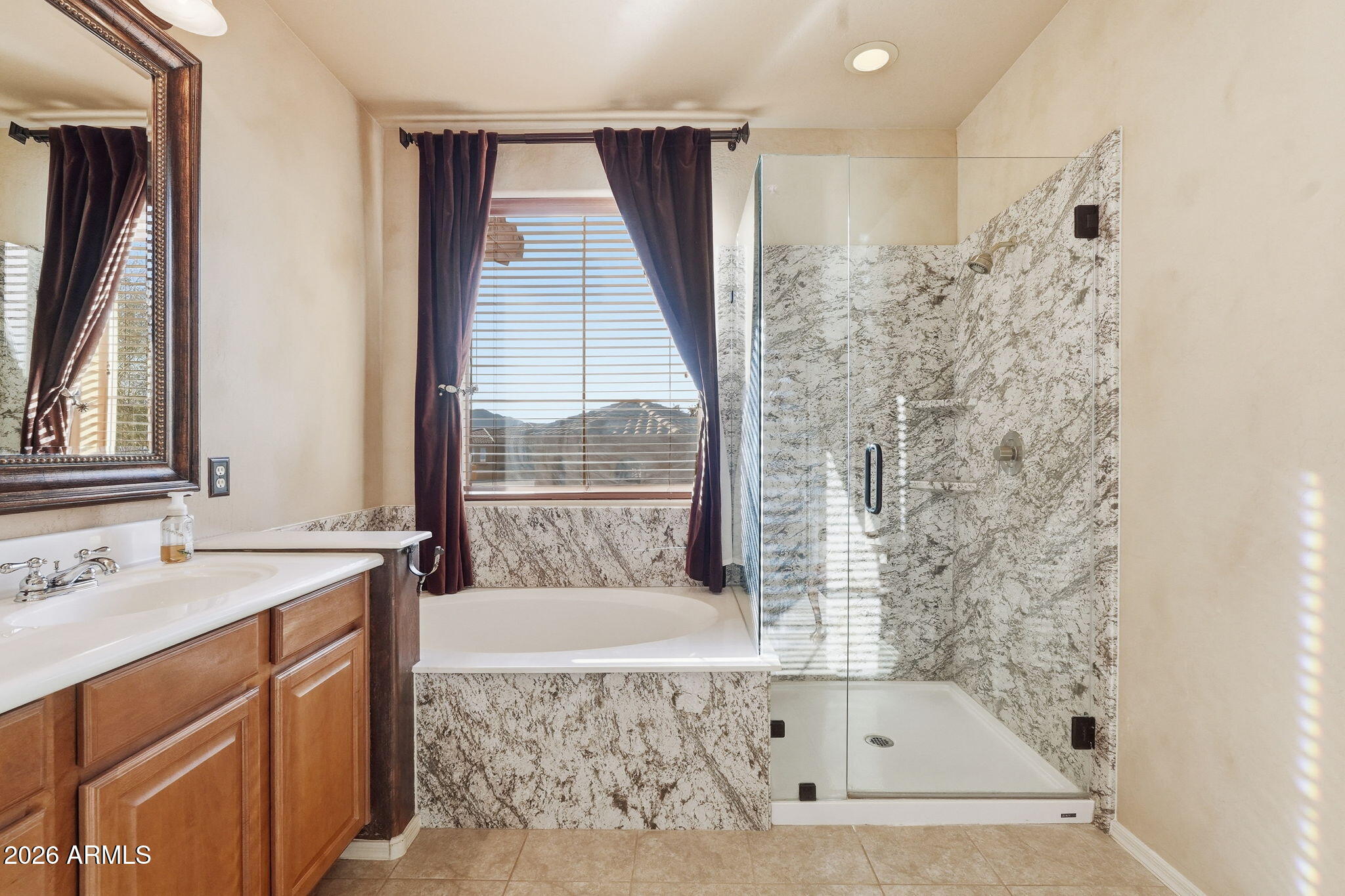 10655 North 9th Street, Unit 232 Phoenix, AZ 85020 - Photo 13 of 22 a bathroom with a bathtub and a sink