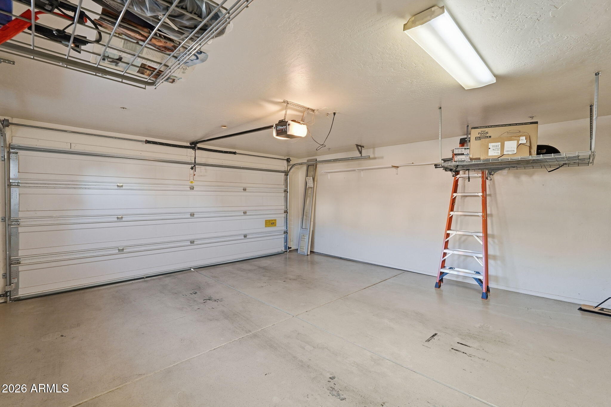 10655 North 9th Street, Unit 232 Phoenix, AZ 85020 - Photo 19 of 22 a view of a room with storage