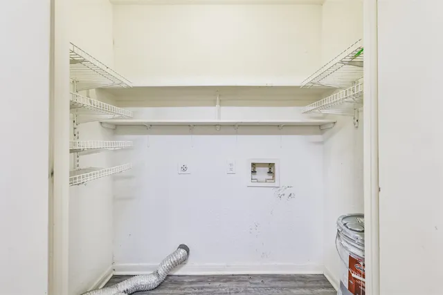 a view of small space with racks on the wall