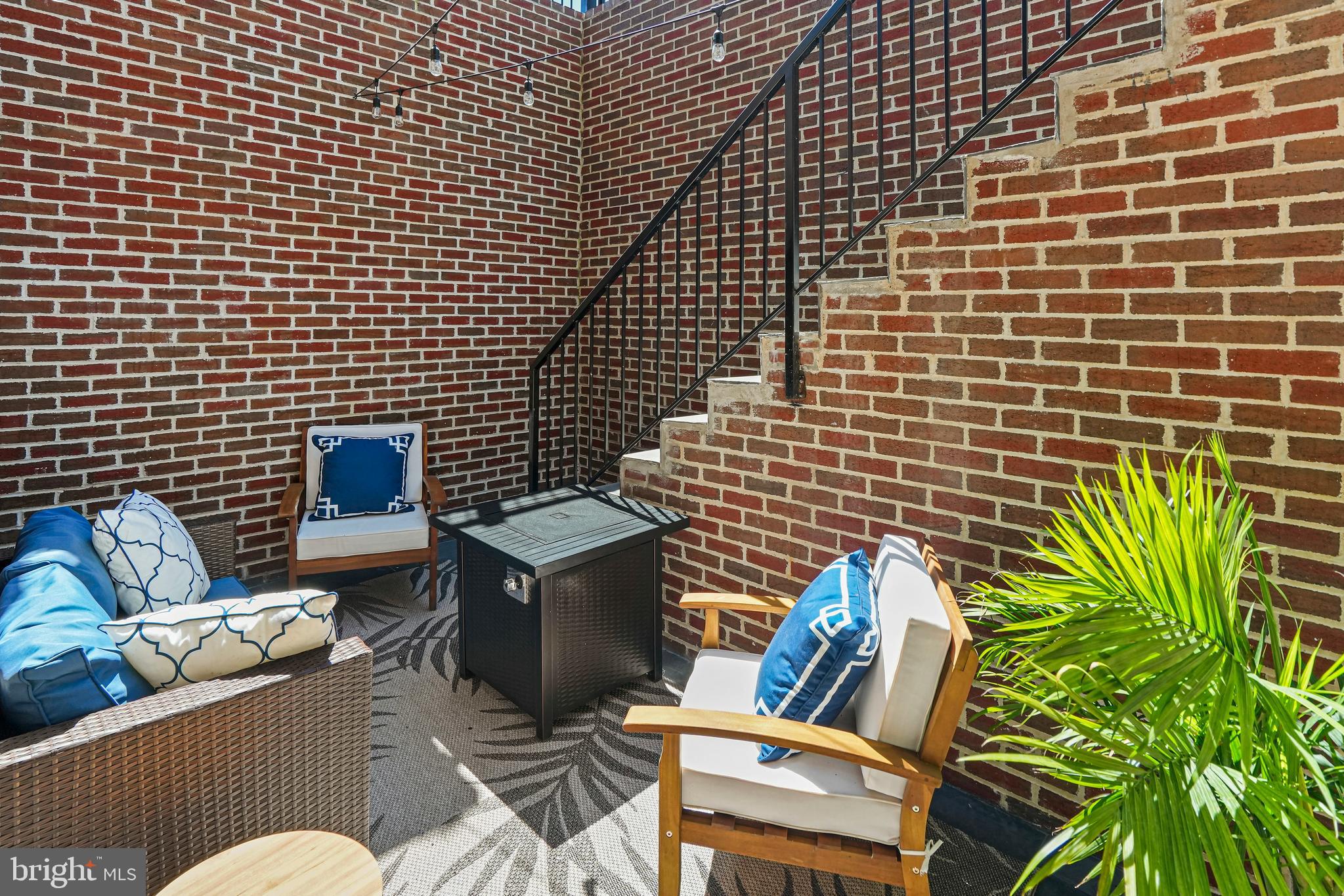 2100 4th Street Northeast, Unit 1 Washington, DC 20002 - Photo 19 of 34 a view of a chairs and table in a patio