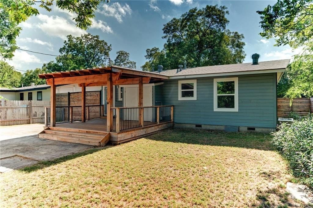 8318 Burrell Drive Austin, TX 78757 - Photo 24 of 27 Back of property featuring crawl space and a wooden deck