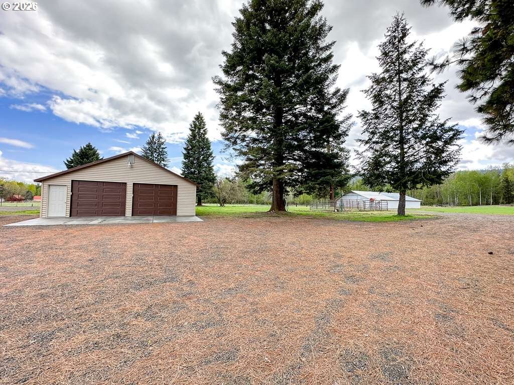46198 Slaughterhouse Road Halfway, OR 97834 - Photo 22 of 40 a house with trees in front of it