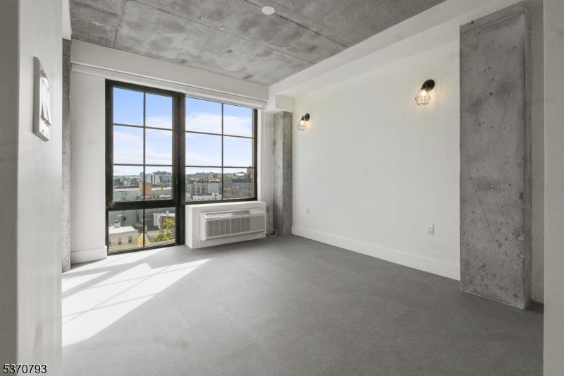 65 McWhorter Street, Unit 705 Newark, NJ 07105 - Photo 13 of 28 a view of an empty room with a window