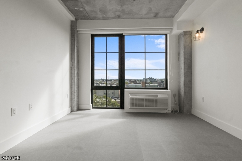 65 McWhorter Street, Unit 705 Newark, NJ 07105 - Photo 14 of 28 a view of an empty room with a window