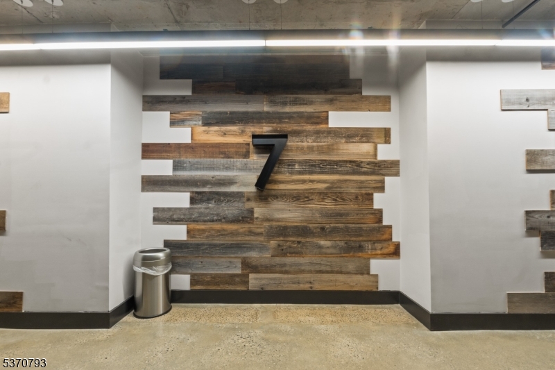 65 McWhorter Street, Unit 705 Newark, NJ 07105 - Photo 24 of 28 a view of store room with racks