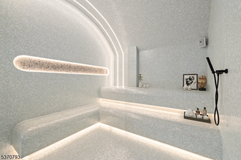 65 McWhorter Street, Unit 705 Newark, NJ 07105 - Photo 5 of 28 a bathroom with a bathtub