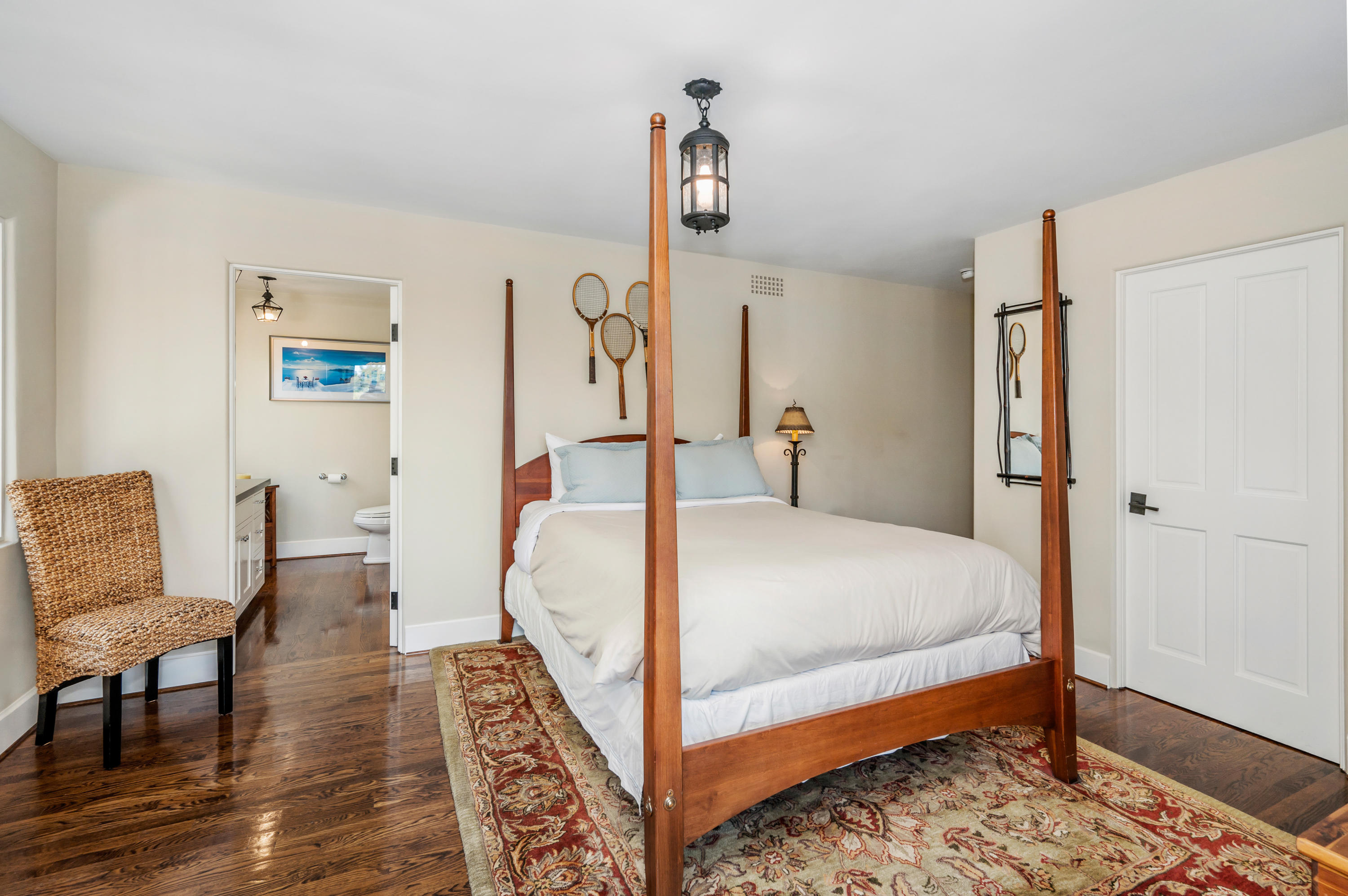 1321 School House Road Montecito, CA 93108 - Photo 13 of 34 a bedroom with furniture and wooden floor