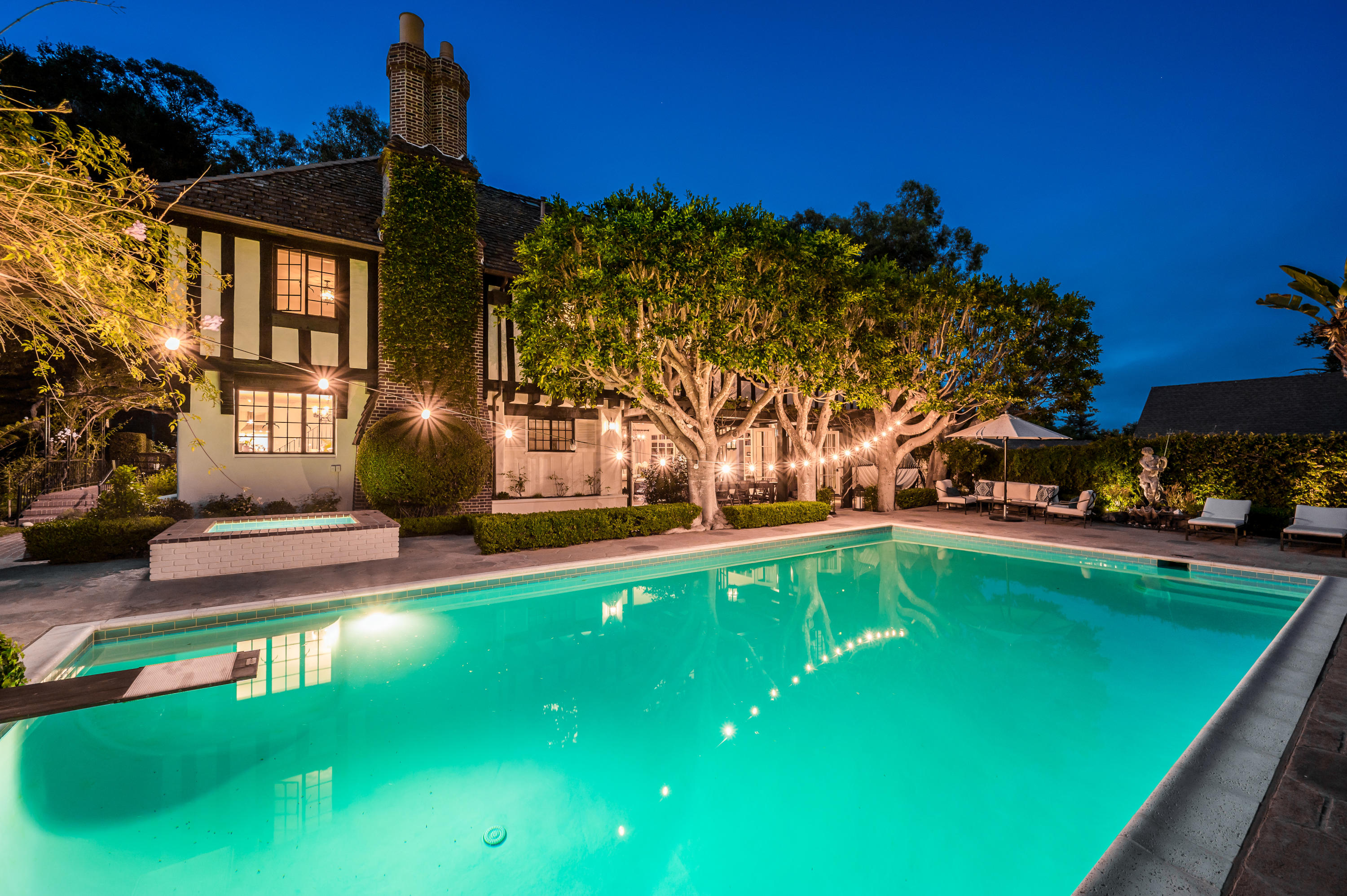 1321 School House Road Montecito, CA 93108 - Photo 33 of 34 a view of a swimming pool with an outdoor space and seating area