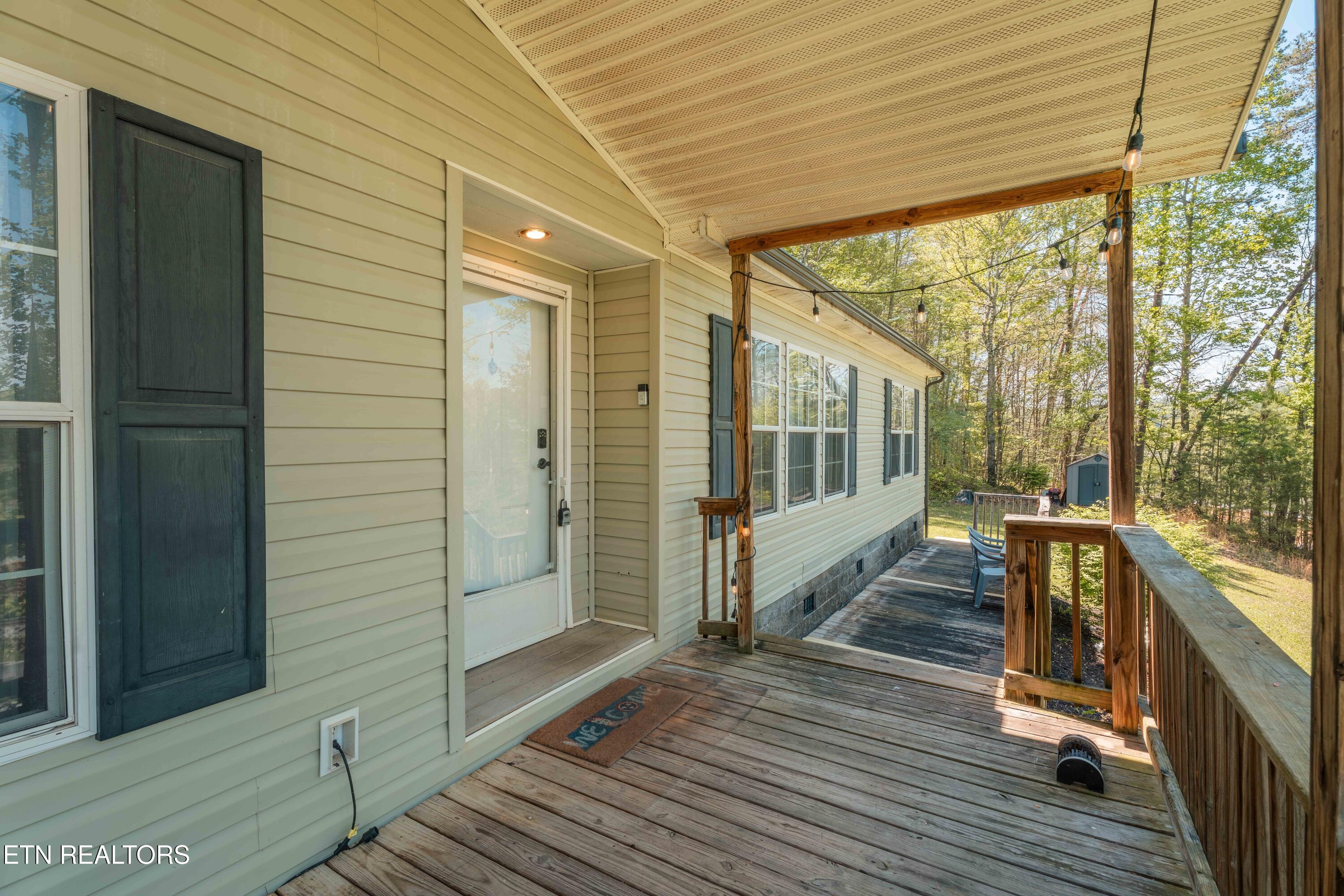 631 Laurel Road Clinton, TN 37716 - Photo 6 of 43 Front Covered Porch