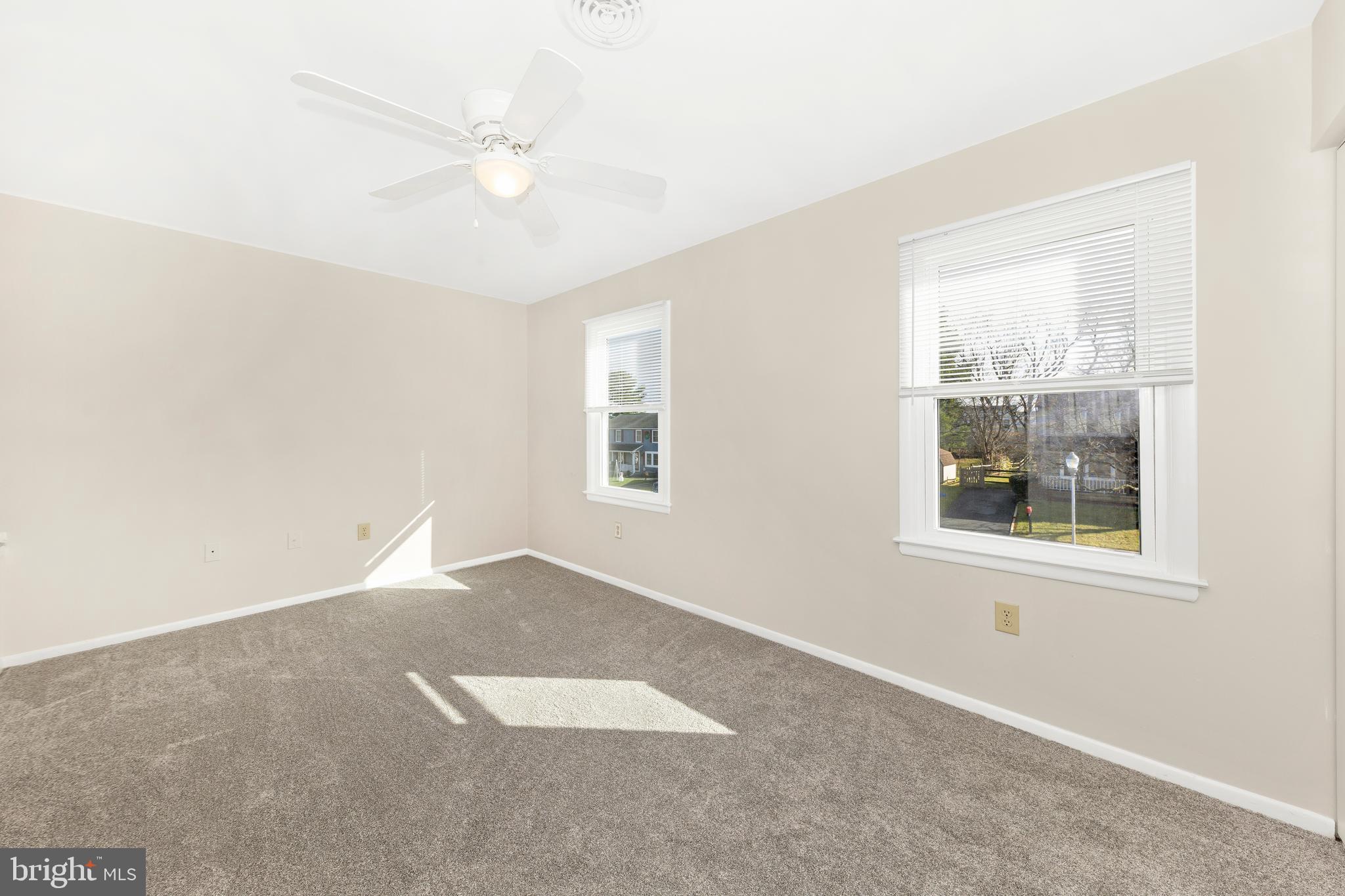 167 Stonegate Drive Frederick, MD 21702 - Photo 22 of 48 an empty room with windows and closet